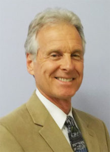 Portrait of Larry Dangott who is the Director of IMAC