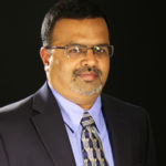 Portrait of Arul Jayaraman who is the Director of IMAC