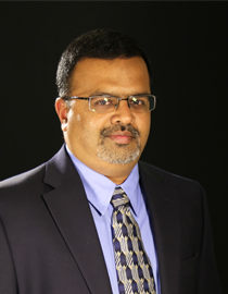 Portrait of Arul Jayaraman who is the Director of IMAC